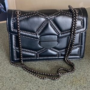 Crossbody - only carried once.